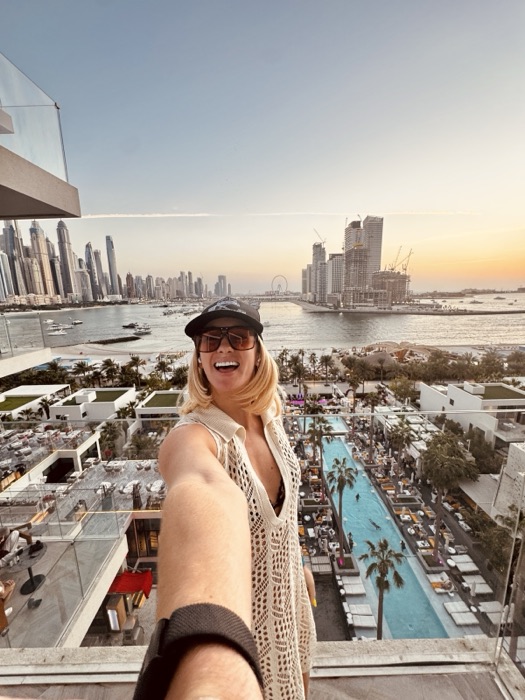 Mary-Anne on a terrace above Dubai Marina at sunset